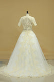 2024 Open Back A Line Wedding Dresses Tulle With Applique And Beads PXC2Z2BD