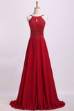 2024 Prom Dresses Spaghetti Straps Beaded Bodice A-Line PZNE1MRF