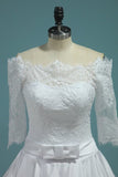 2024 Wedding Dresses Boat Neck Satin With Applique And Sash PFQJPM64