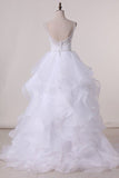 2024 Spaghetti Straps Wedding Dresses A-LINE With Applique PKR1K74Z