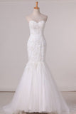 2024 Wedding Dresses Sweetheart Mermaid Tulle With Applique PK5ASXZK