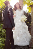 2024 New Arrival V Neck Long Sleeves Tulle With Applique Wedding Dresses PBGA4H7Q