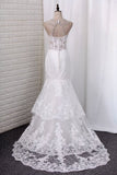 2024 Mermaid Wedding Dresses Tulle Spaghetti Straps With Applique PKD53K17