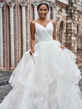 A-Line/Princess Tulle Ruffles Spaghetti Straps Sleeveless Sweep/Brush Train Wedding Dresses TPP0006090