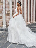 A-Line/Princess Tulle Ruffles Spaghetti Straps Sleeveless Sweep/Brush Train Wedding Dresses TPP0006090